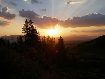 Scenic view of sunset over landscape