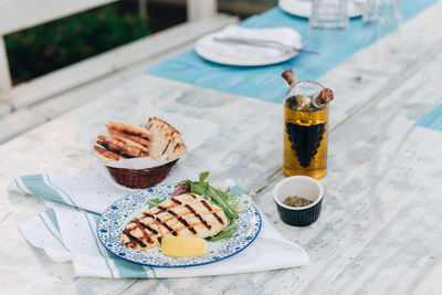 High angle view of pita bread served on table