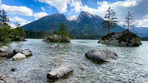 Scenic view of rocks in mountains against sky