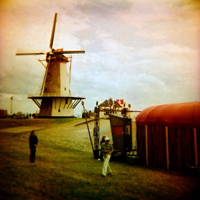 field, sky, wind power, rural scene, alternative energy, lifestyles, wind turbine, windmill, men, environmental conservation, landscape, fuel and power generation, renewable energy, leisure activity, agriculture, cloud - sky, farm, traditional windmill