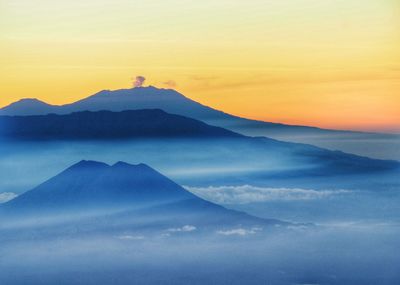 Scenic view of mountains at sunset