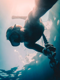 Close-up of person swimming in sea