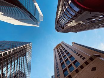 Low angle view of modern buildings against sky