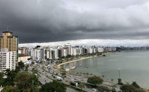 High angle view of buildings in city against sky