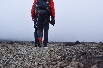 Low section of couple hiking