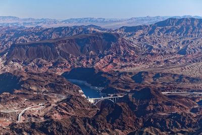 Aerial view of mountains against sky