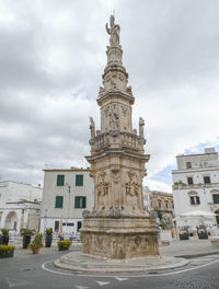 Low angle view of historic building against sky