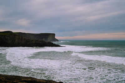 Scenic view of sea against sky during sunset