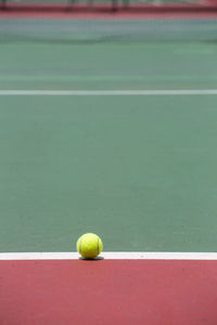 Close-up of green ball on table