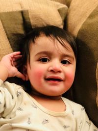 Portrait of cute smiling boy at home