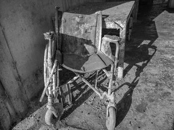 Black and white broken wheelchair