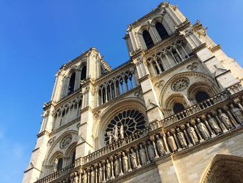 Low angle view of cathedral against blue sky