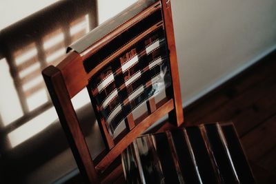 High angle view of film negatives on chair at home