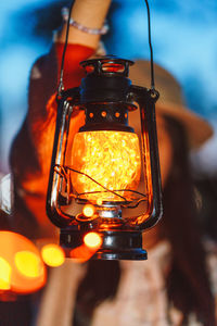 Low angle view of illuminated light bulb