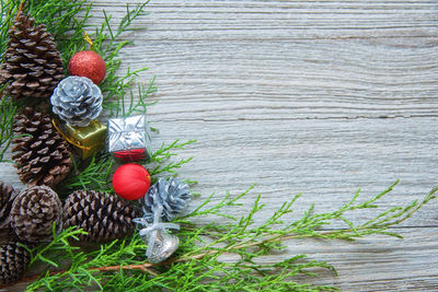 High angle view of christmas decorations on wood