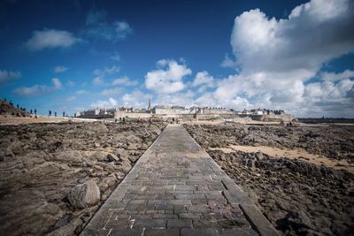 Panoramic view of historical building against cloudy sky