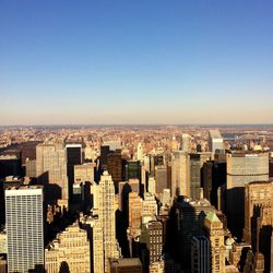 Cityscape against clear sky