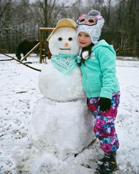 Full length of boy in snow on land