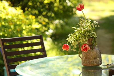 Close-up of flower vase on table