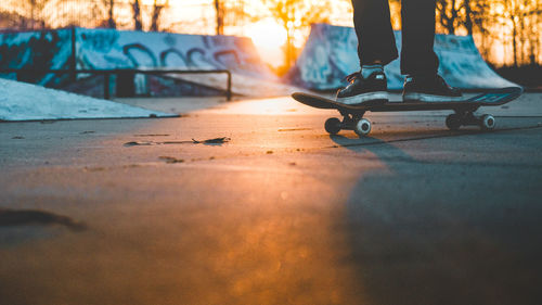 Low section of skateboarding on floor