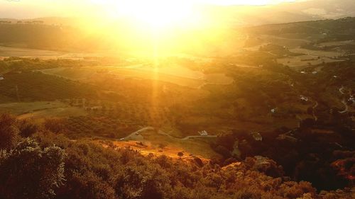 High angle view of bright sun over landscape