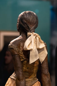 Rear view of statue of woman 