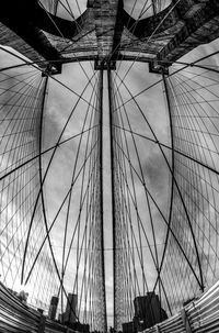 Fish-eye lens of brooklyn bridge against cloudy sky