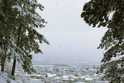 Scenic view of sea against sky during winter