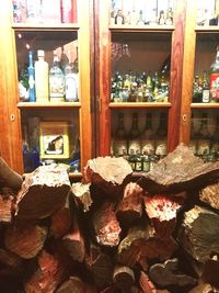 Stack of bottles on display at store