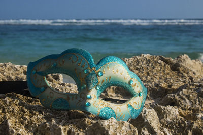 Close-up of blue sea water on rocks