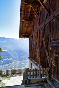 View of building with snowcapped mountain in background