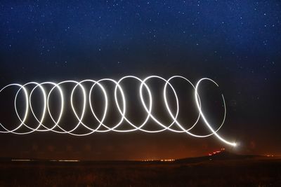 Light painting on blue sky at night