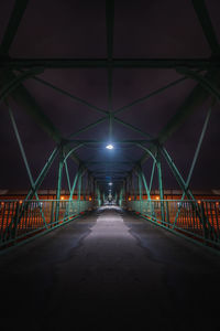 Empty footbridge at night