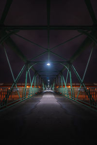 Empty footbridge at night