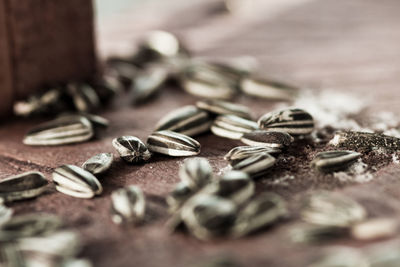 Close-up of sunflower seeds on wooden table