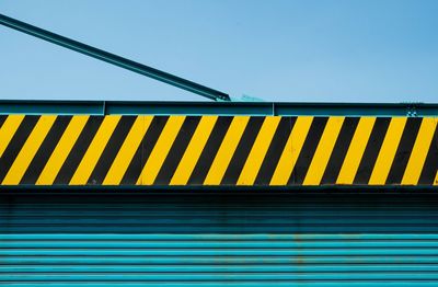 Garage door against clear sky