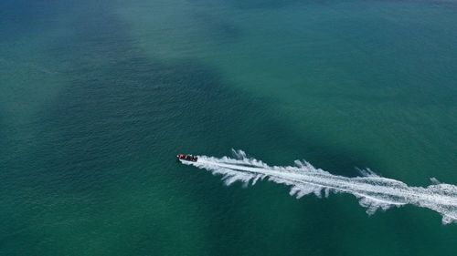 High angle view of sailboat in sea