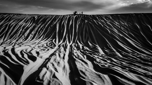Low angle view of land against sky
