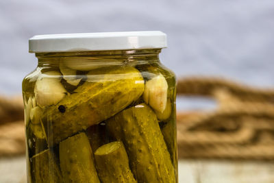 Close-up of glass jar on table