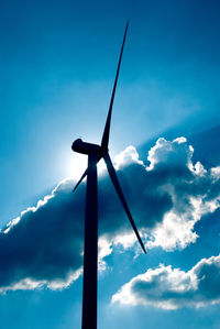 Low angle view of wind turbine against sky