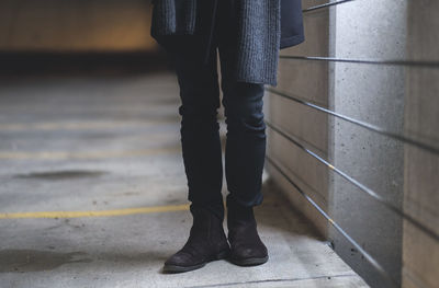 Low section of woman standing on floor