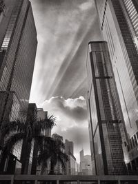 Low angle view of skyscrapers against sky