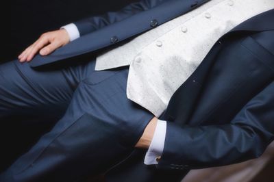 Midsection of man wearing formalwear