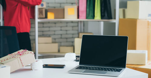 Man using laptop on table