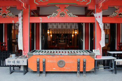 Empty chairs and tables in a temple