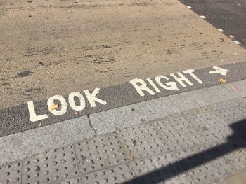 High angle view of text on road