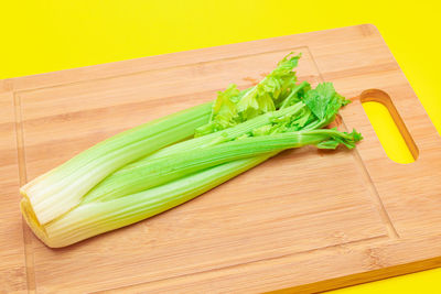 High angle view of chopped vegetables on cutting board