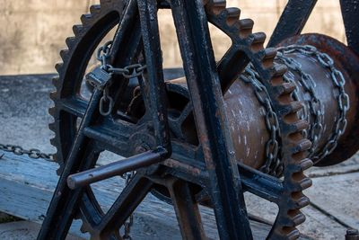 High angle view of old rusty wheel
