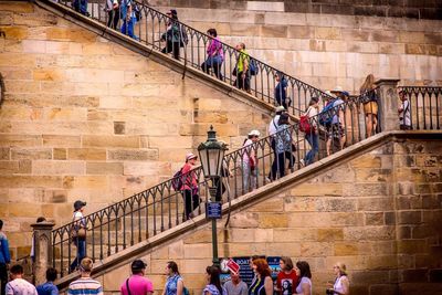 People walking on building steps