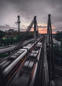 High angle view of railroad tracks against sky during sunset